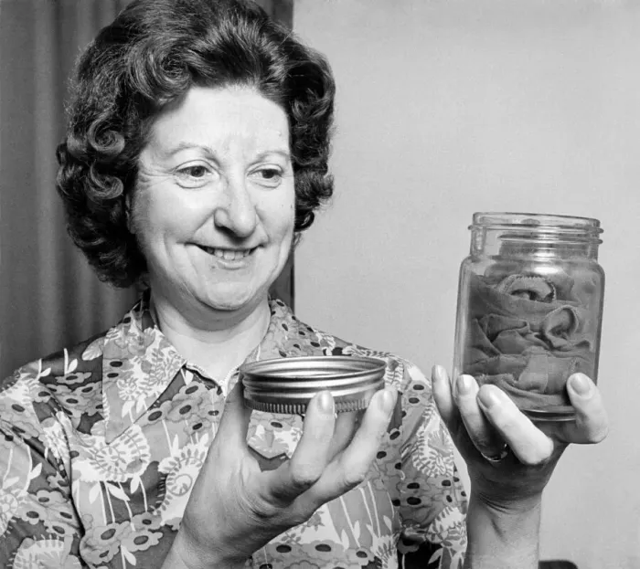 Framed Print : Alice Bough keeps her precious war-time stockings in an airtight jar