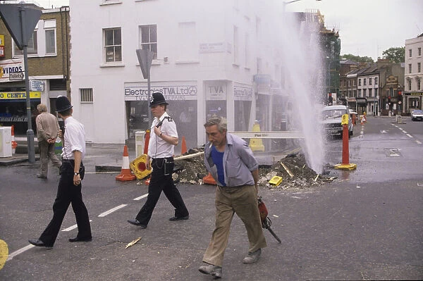 Alisdair MacDonalds 1988 award winning picture of a watermain in Pimlico after a