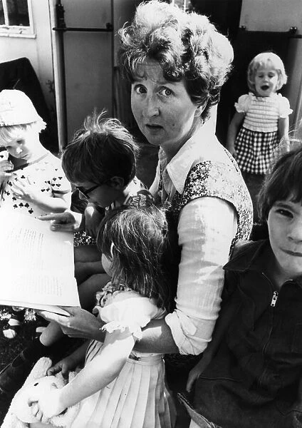 Alison Clark with children in Nursery School, Cambridge, July 1977