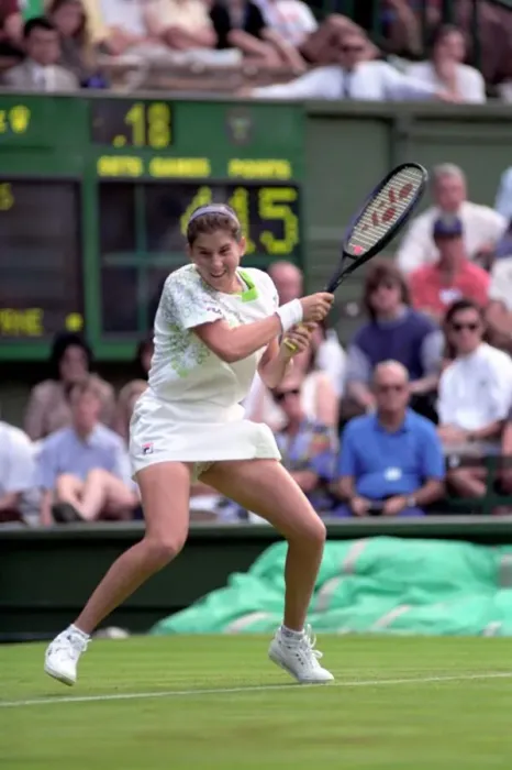 Framed Print : All England Lawn Tennis Championships at Wimbledon. Monica Seles in action during