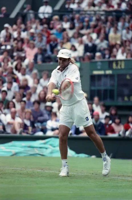 Framed Print : All England Lawn Tennis Championships at Wimbledon. Andre Agassi in action during Framed Print : All England Lawn Tennis Championships at Wimbledon. Andre Agassi in action during