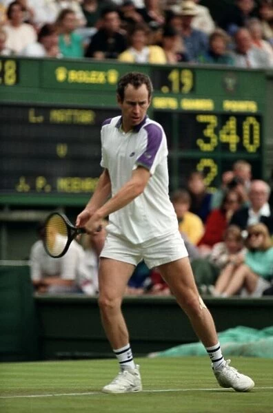 All England Lawn Tennis Championships at Wimbledon. John McEnroe in action during