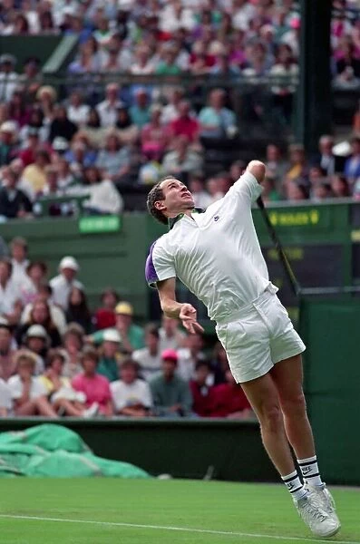All England Lawn Tennis Championships at Wimbledon. John McEnroe in action during