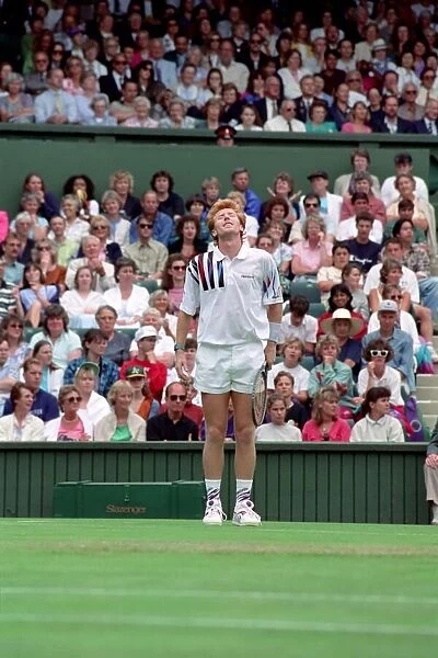 All England Lawn Tennis Championships at Wimbledon. Mark Woodforde shows his