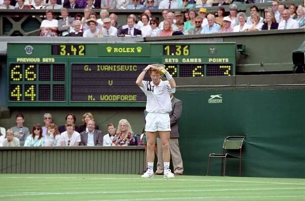 All England Lawn Tennis Championships at Wimbledon. Mark Woodforde shows his