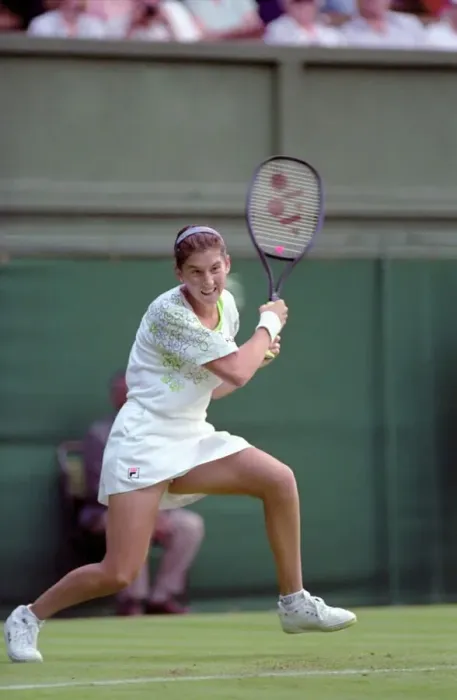 Framed Print : All England Lawn Tennis Championships at Wimbledon. Monica Seles in action during