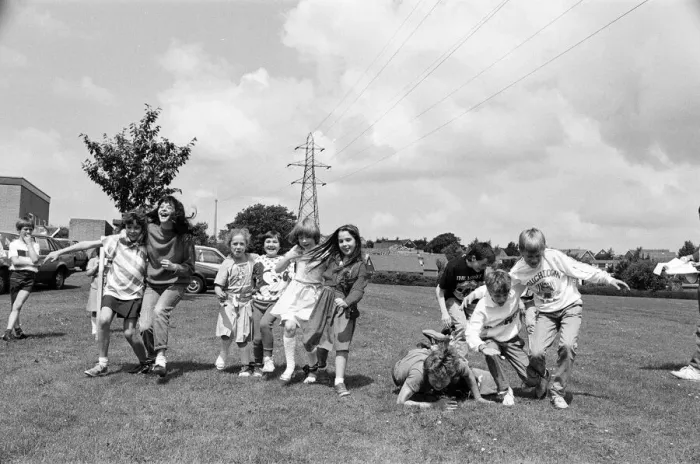 Framed Print : All fall down! Contestants in the three-legged race at Scissett C of E First School Framed Print : All fall down! Contestants in the three-legged race at Scissett C of E First School