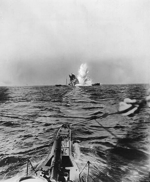 Allied steamer being torpedoed by a German U-boat. Circa 1941