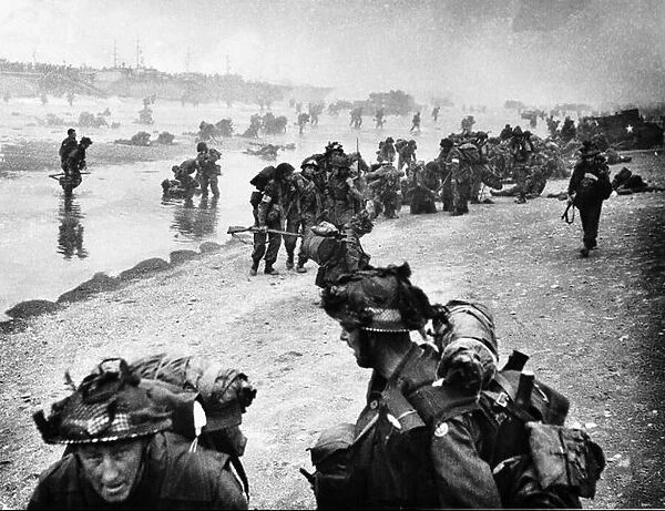 Allied troops land on beach during World War Two invasion