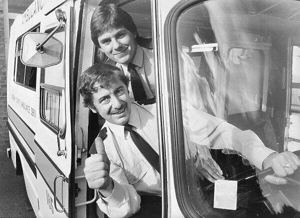 Ambulancemen George Stacey (top) and Gordon Dews give the thumbs-up