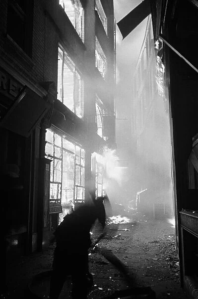 Amen Corner shops blaze furiously as nine thousand incendiary bombs fall on the city of