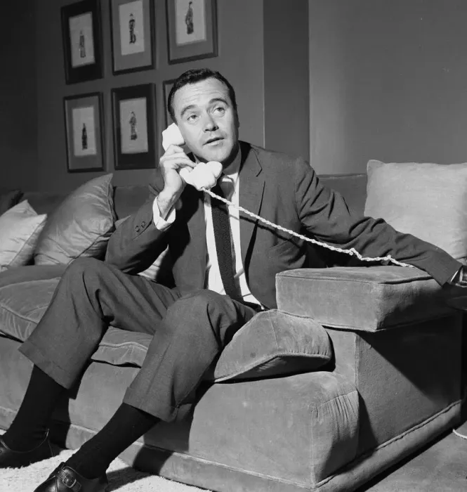 Framed Print : American actor Jack Lemmon on the telephone in his room at the Mayfair Hotel in London Framed Print : American actor Jack Lemmon on the telephone in his room at the Mayfair Hotel in London