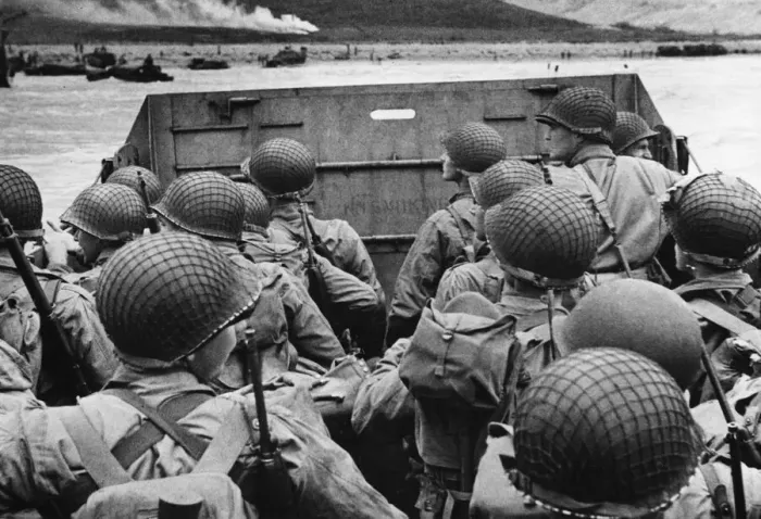 Framed Print : American assault troops in landing craft huddle behind the protective front of the craft Framed Print : American assault troops in landing craft huddle behind the protective front of the craft