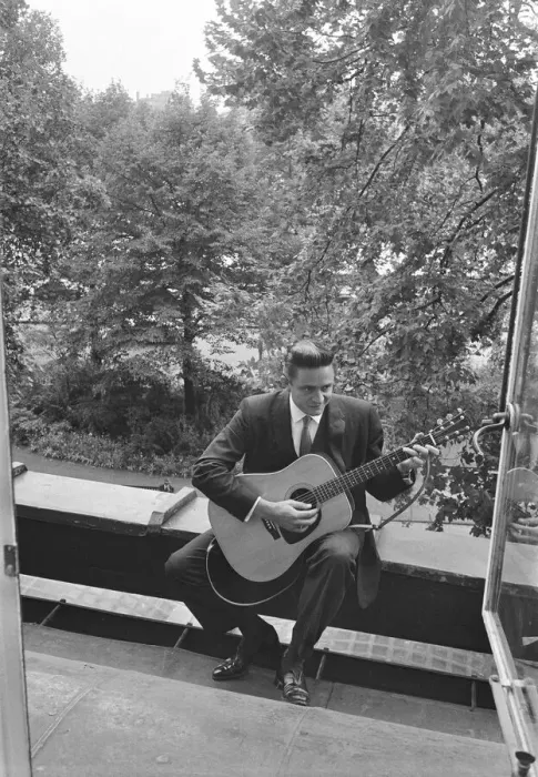 Framed Print : American country singer and musician Johnny Cash poses for photographers at the Savoy Framed Print : American country singer and musician Johnny Cash poses for photographers at the Savoy