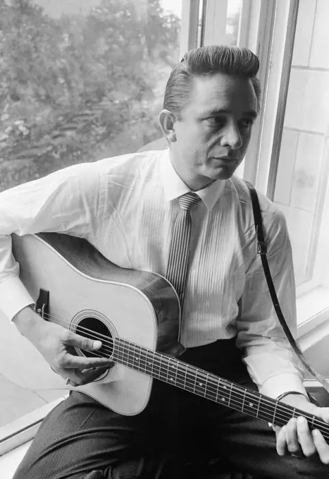 Framed Print : American country singer and musician Johnny Cash poses for photographers at the Savoy Framed Print : American country singer and musician Johnny Cash poses for photographers at the Savoy