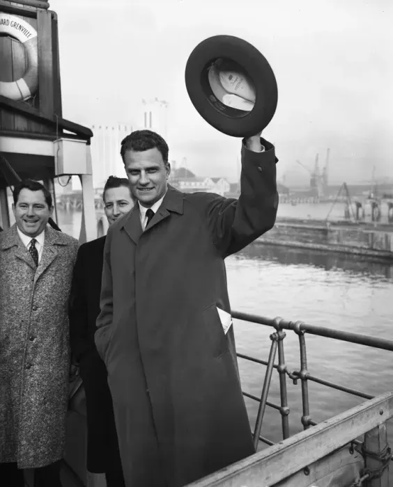 Framed Print : American evangelist Billy Graham salutes the huge crowd who gathered to welcome him
