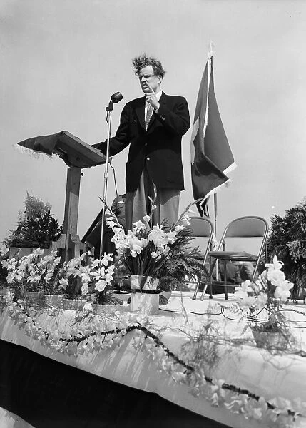 American evangelist Billy Graham visits Burtonwood in Lancashire to give a speech during