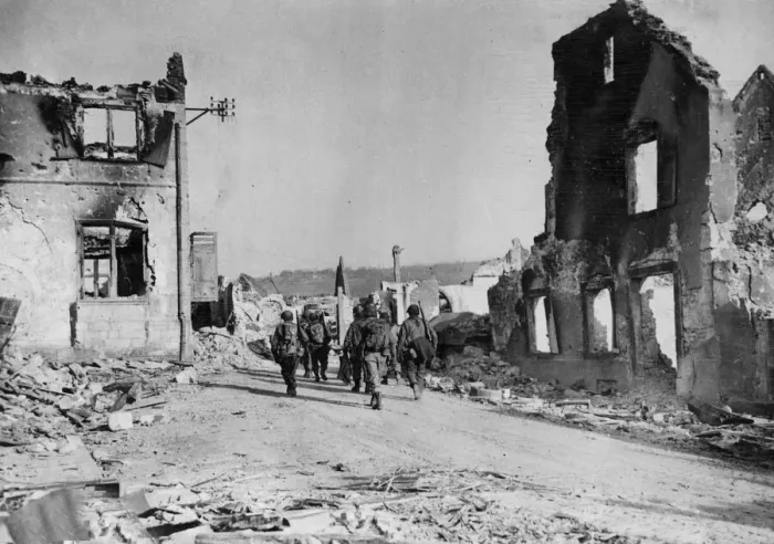 Framed Print : American infantrymen movie through a wrecked street in a shattered town advancing to Framed Print : American infantrymen movie through a wrecked street in a shattered town advancing to