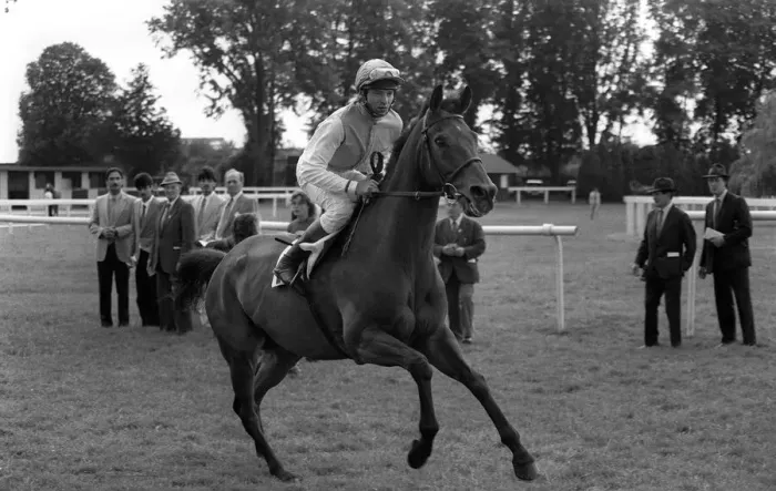 Framed Print : American jockey Steve Cauthen takes a break before racing at Kempton Park Framed Print : American jockey Steve Cauthen takes a break before racing at Kempton Park