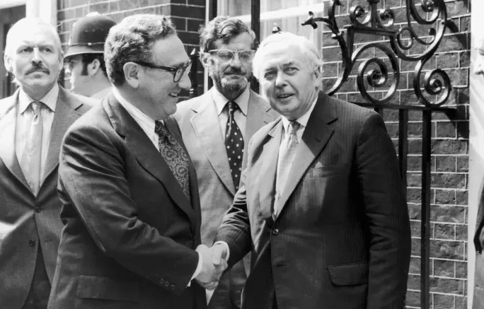 Framed Print : American peace maker Dr Henry Kissinger (left) seen here after flying into London Framed Print : American peace maker Dr Henry Kissinger (left) seen here after flying into London
