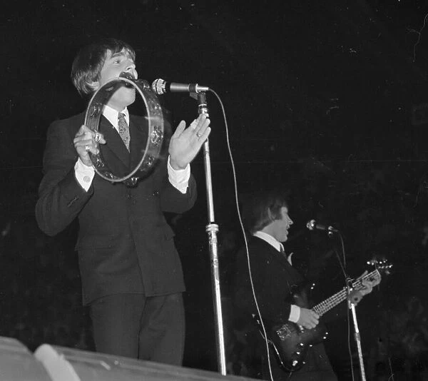 American pop group The Monkees performing on stage at a concert in London. July 1967
