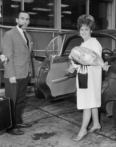 American pop singer Brenda Lee with Bob Newhart upon arrival at London airport