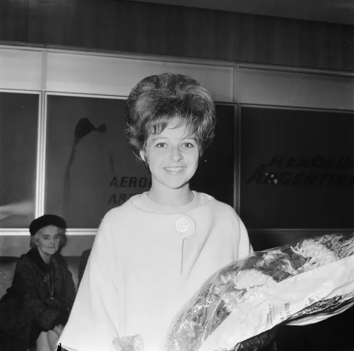 Framed Print : American pop singer Brenda Lee smiles upon arrival at London airport