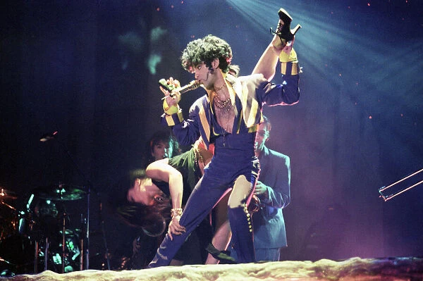 American pop star Prince performing on stage at the National Indoor Arena in Birmingham