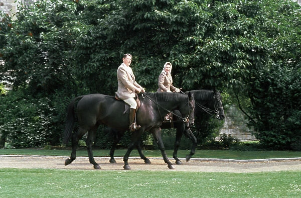 American President Ronald Reagan astride the horse Centennial riding with Queen Elizabeth
