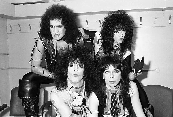 American rock group Kiss seen here in a very quick break between numbers at their concert