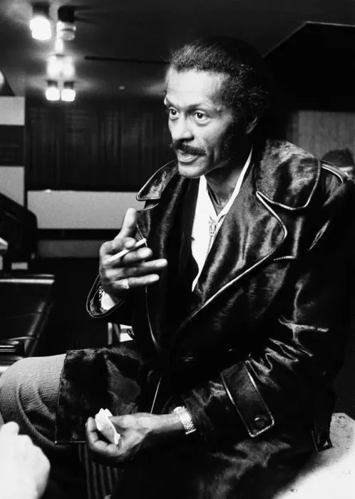 Framed Print : American rock n roll singer Chuck Berry smoking a cigarette after a concert