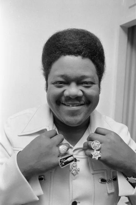 Framed Print : American rock and roll singer and musician Fats Domino shows off his diamond rings in his