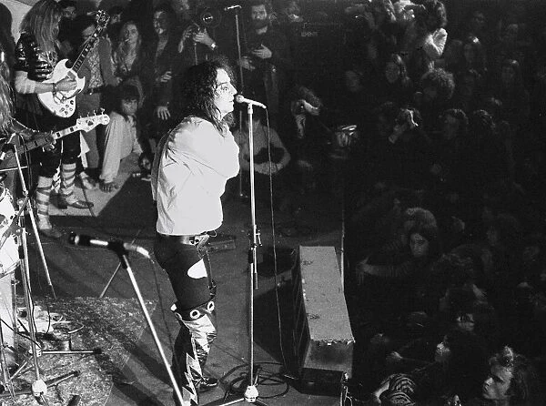 American rock singer Alice Cooper performing on stage during a concert on his Love It To