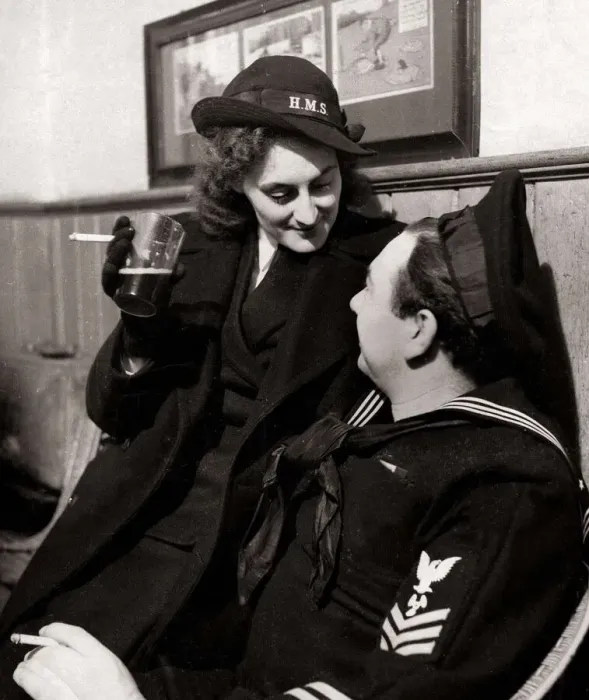 Framed Print : American sailor chatting to a Wren in a pub in Northern Ireland port Framed Print : American sailor chatting to a Wren in a pub in Northern Ireland port