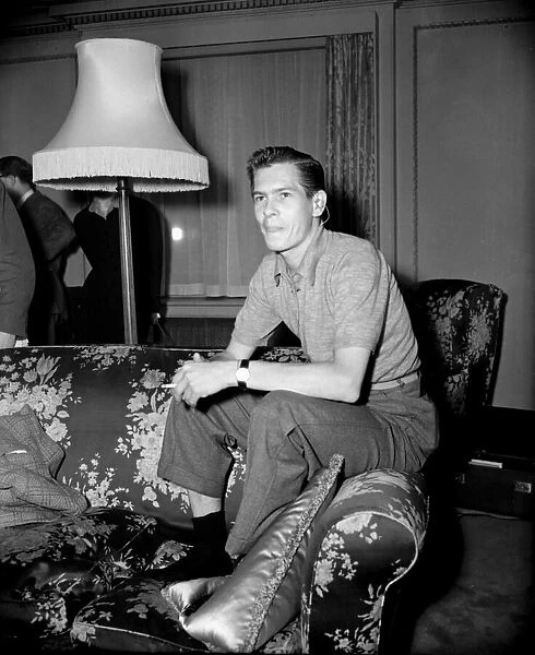 American singer Johnny Ray in his hotel room after his arrival in England April 1955