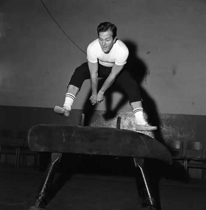 Framed Print : American singer, Pat Boone, exercises for his part in his next film Framed Print : American singer, Pat Boone, exercises for his part in his next film