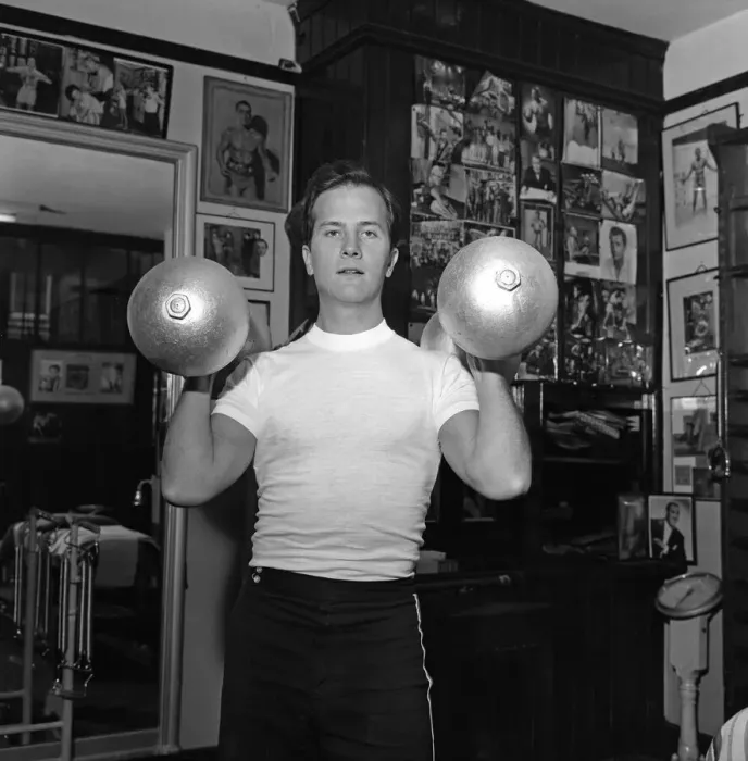 Framed Print : American singer, Pat Boone, exercises for his part in his next film Framed Print : American singer, Pat Boone, exercises for his part in his next film