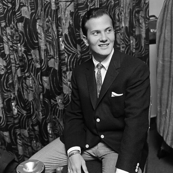 American singer, Pat Boone. He is in London for the '