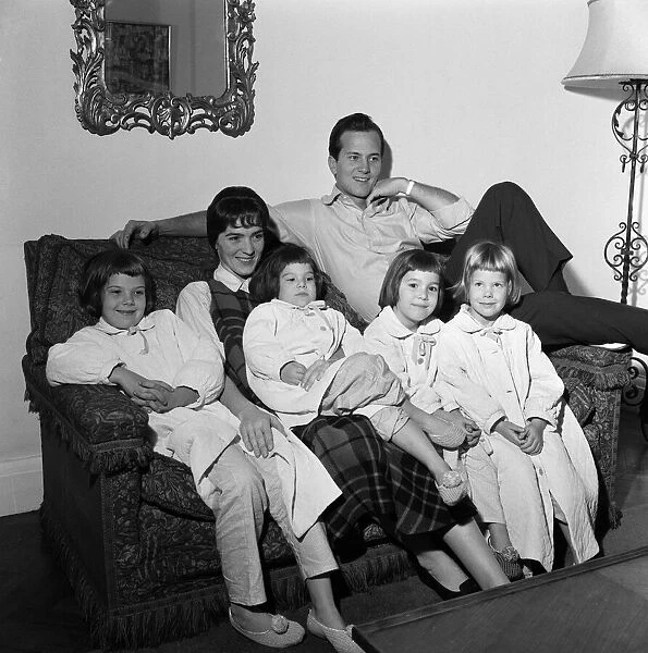 American singer, Pat Boone, in London with his wife Shirley, and their four daughters