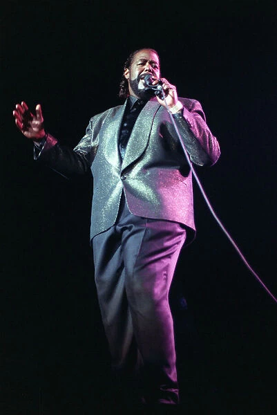 American singer songwriter Barry White performing in concert. December 1988