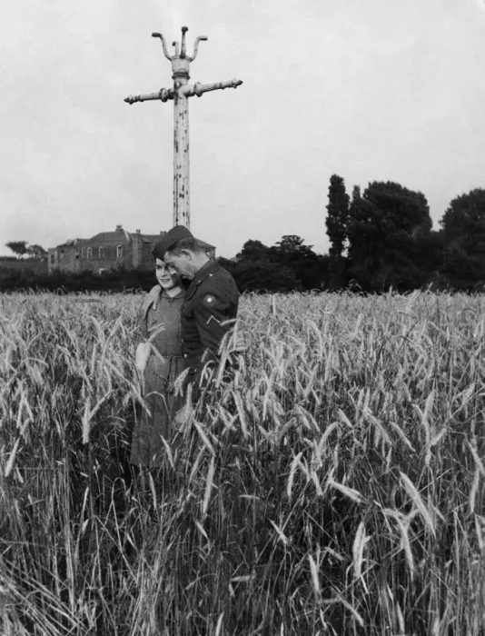 Framed Print : An American soldier and his girlfriend take a stroll through a field of barley near Framed Print : An American soldier and his girlfriend take a stroll through a field of barley near