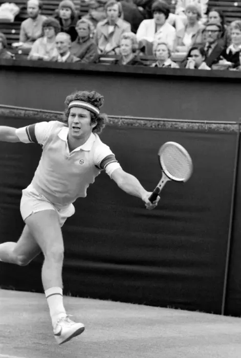 Framed Print : American tennis star John McEnroe in action at Queens Club. June 1980 Framed Print : American tennis star John McEnroe in action at Queens Club. June 1980