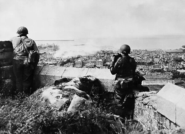 American troops on a hill overlooking the city and harbour in Cherbourg