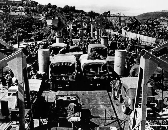 Framed Print : American vehicles loaded aboard landing ships in the river Dart during preparations for