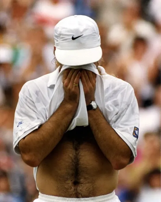 Framed Print : Andre Agassi emotional after beating Goran Ivanisevic in the Mens Singles Final