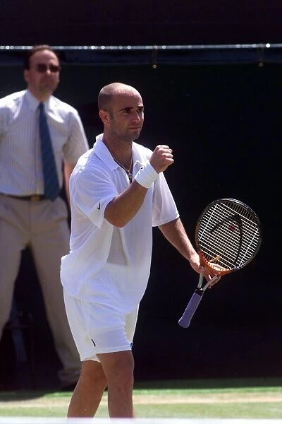 Andre Agassi tennis player at Wimbledon 1999 celebrates victory over Gustavo Kuerten in