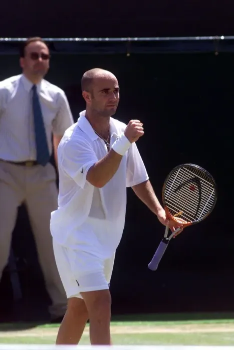 Framed Print : Andre Agassi tennis player at Wimbledon 1999 celebrates victory over Gustavo Kuerten in Framed Print : Andre Agassi tennis player at Wimbledon 1999 celebrates victory over Gustavo Kuerten in