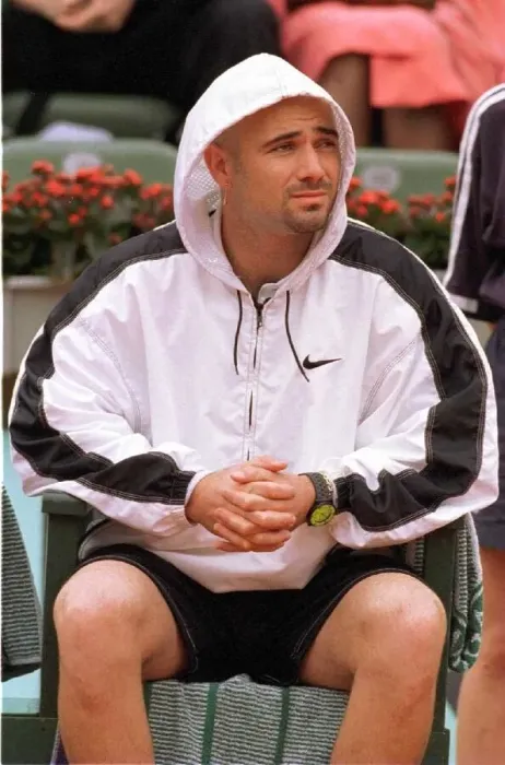 Framed Print : Andre Agassi tennis star in action in the rain during the French Open tennis tournament Framed Print : Andre Agassi tennis star in action in the rain during the French Open tennis tournament