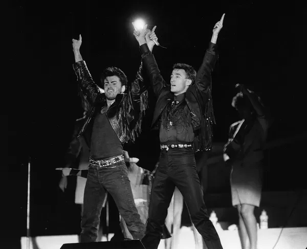 Andrew Ridgeley and George Michael of Wham 1986 pop group at farewell concert