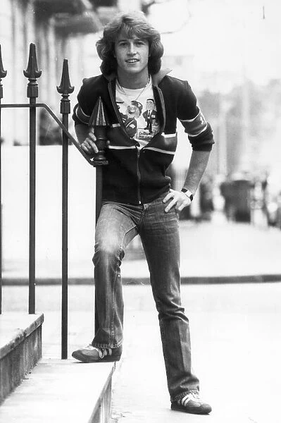 Andy Gibb, younger brother of Bee Gees Barry, Maurice and Robin, poses on a London street